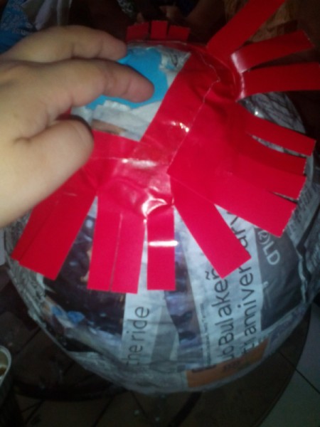 DIY Piñata - cut art paper into tassels/fringe