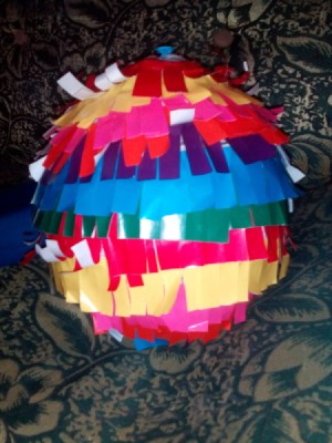 DIY Piñata - balloon wrapped with fringed paper - allow to dry