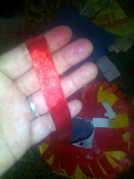 DIY Piñata - attach ribbon to sides of hole