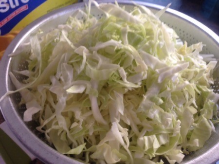 grated cabbage in bowl