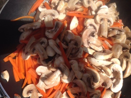carrot and mushrooms in pan