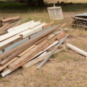 A pile of scrap lumber at a construction site.