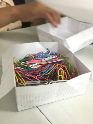 Folded Paper Box - box filled with colored paper clips