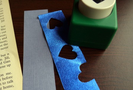 Punched Paper Bookmark - Randomly cut shapes along the paper strip using your paper punch.