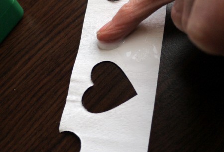 Punched Paper Bookmark - Spread white glue over the reverse side of the paper.