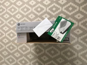 A product box with receipt and manual, saved in case of a return.