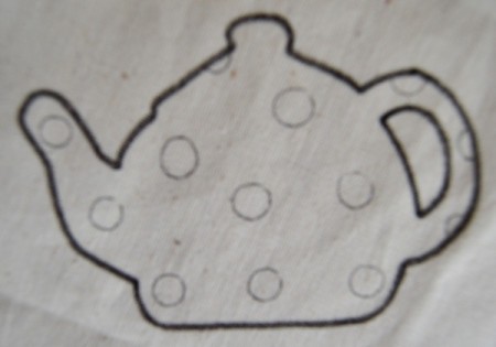 Tea is Served! - Tea Tray Cloth - Use the ultra fine pen to draw a design on each tea pot, such as hearts, circles, flowers, etc. Iron the cloth again before continuing.