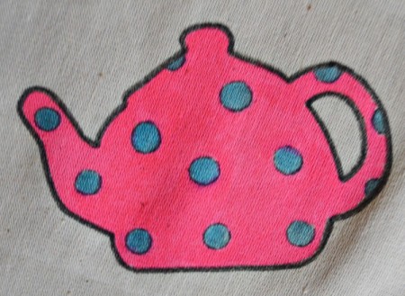 Tea is Served! - Tea Tray Cloth - Now color the background of each teapot and again iron the cloth before continuing with the next step. - closeup of pink pot with blue dots