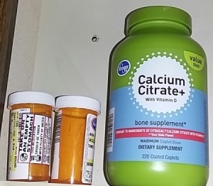 Prescription bottles in a medicine cabinet.