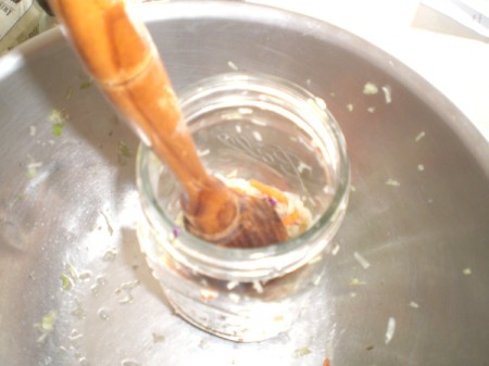 squeezing Cole Slaw with meat tenderizer