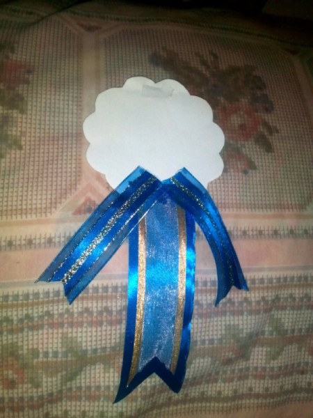DIY Award Ribbons - glue ribbons to bottom center of the cardboard backing