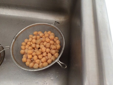 garbanzo beans in strainer
