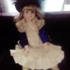Value of Porcelain Doll - doll wearing a lacy dress