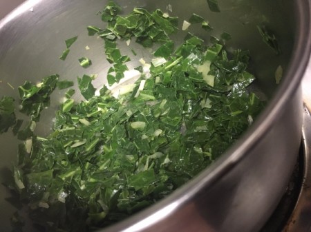 finely chopped Kale and Onion in pan