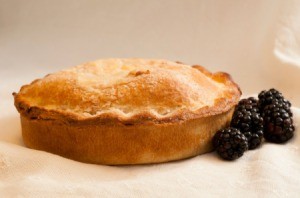 Seedless Blackberry Pie on a white background.