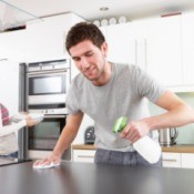 Man using Homemade Softscrub in the kitchen