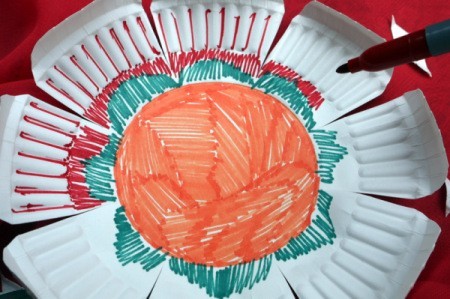Paper Plate Flower - adding more color around center and out onto the petals