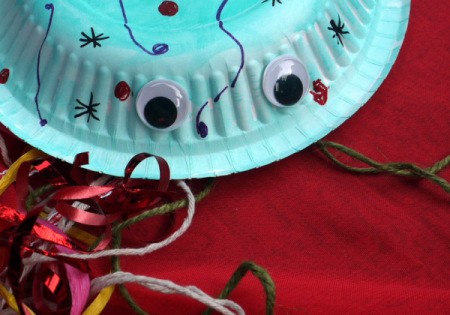 Fun Paper Plate Jelly Fish Decoration - two eyes added to side edge of plate
