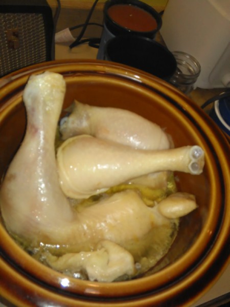 chicken cooking in a crockpot
