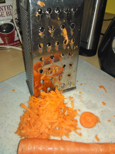 grater and grated carrot