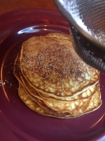 Mini Cream Cheese Crepes piled on plate