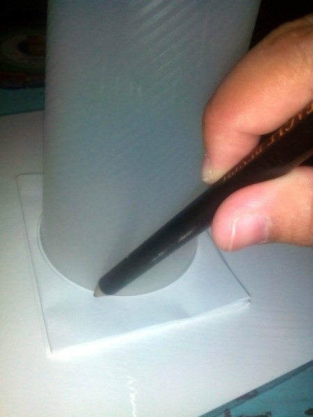 Cutting Duplicate Paper Shapes - tracing the circle on top of folded paper