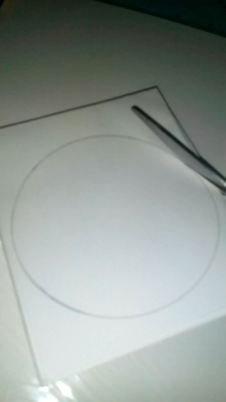 Cutting Duplicate Paper Shapes - cutting out the circles