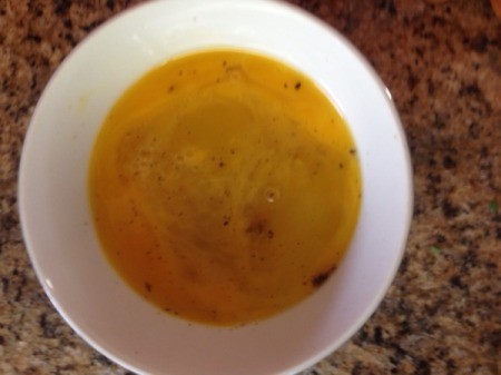 mixed egg and pepper in bowl