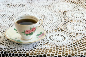 Crochet Tablecloth with a cup of tea on it.