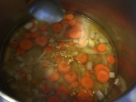 Carrot and onion in soup for carrot ginger soup.
