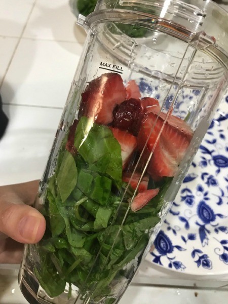 Green Blended Juice ingredients in blender