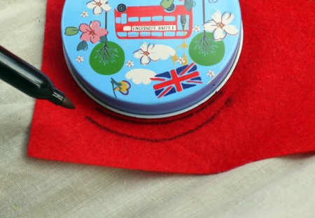 One Eyed Monster Badge - use circular lid to help make a mouth on red felt