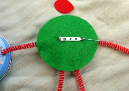 One Eyed Monster Badge - stick pin back to back side of monster