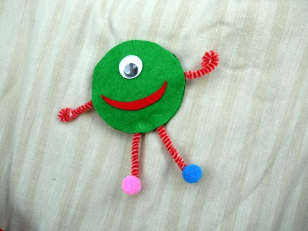 One Eyed Monster Badge - badge ready to wear once glue is dry