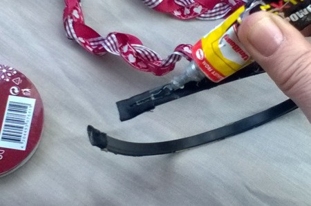 Revamp an Old Headband with Ribbon - apply glue along the band