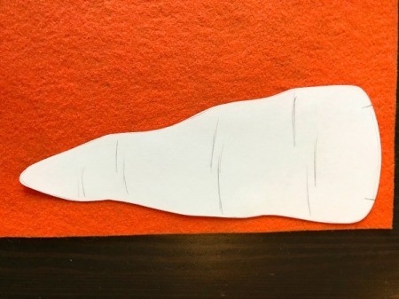 Felt Carrot Money Pocket - stick template to felt with rolled pieces of tape