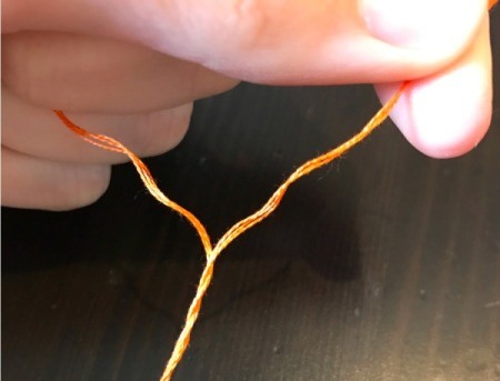 Felt Carrot Money Pocket - cut a length of embroidery floss and divide into two 3 strand pieces