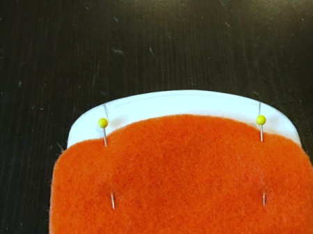 Felt Carrot Money Pocket - lay top carrot piece on bottom and put both on the template and mark the start and stop spots with pins