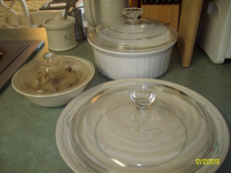 An old casserole lid covering a plate.