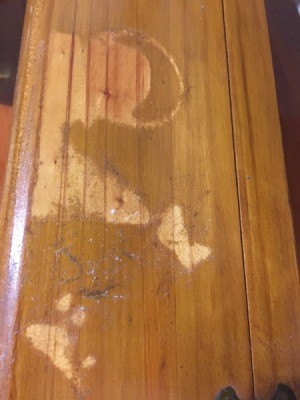 Varnished Damaged by Spilled Perfume  - finish damage on dresser