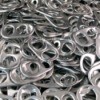 A pile of pop can tabs.