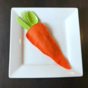 Felt Carrot Utensil Holder - utensil holder on plate