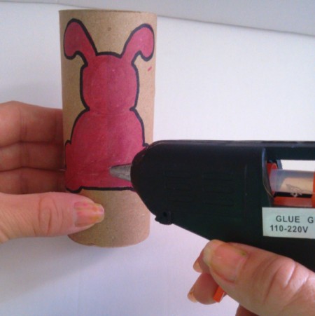 Toilet Paper Tube Easter Bunnies - adding a dot of hot glue to bunny bottom