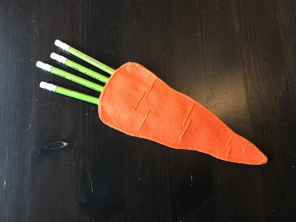 Felt Carrot Pencil Gift Pocket - pencils protruding from pocket like carrot top