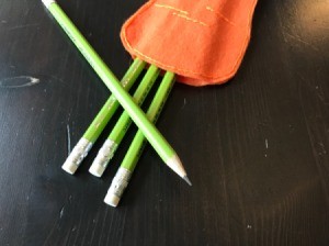 Felt Carrot Pencil Gift Pocket - closeup of pocket end of carrot with pencils