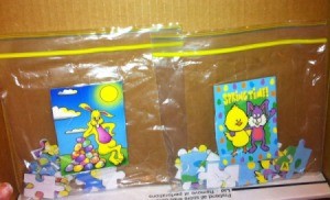 Two children's puzzles in plastic bags.