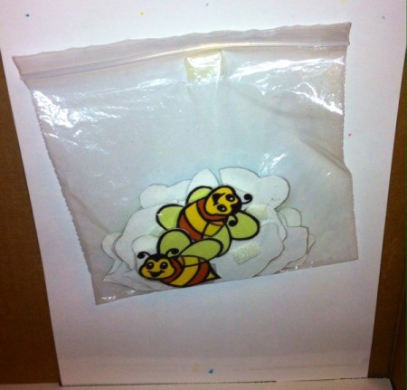 Spring Flowers Fine Motor Coloring and Velcro Activity - bees and butterflies can be stored in a plastic zipper bag on back of laminated flower page