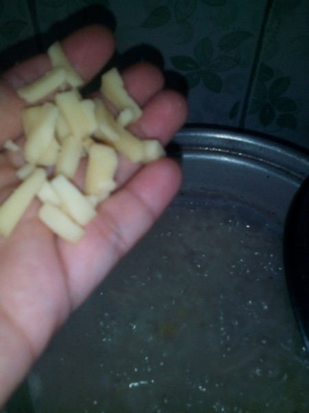 Adding ingredients to porridge.