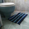 A bathroom with blue fixtures.