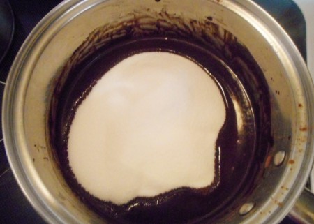 sugar added to chocolate in pan